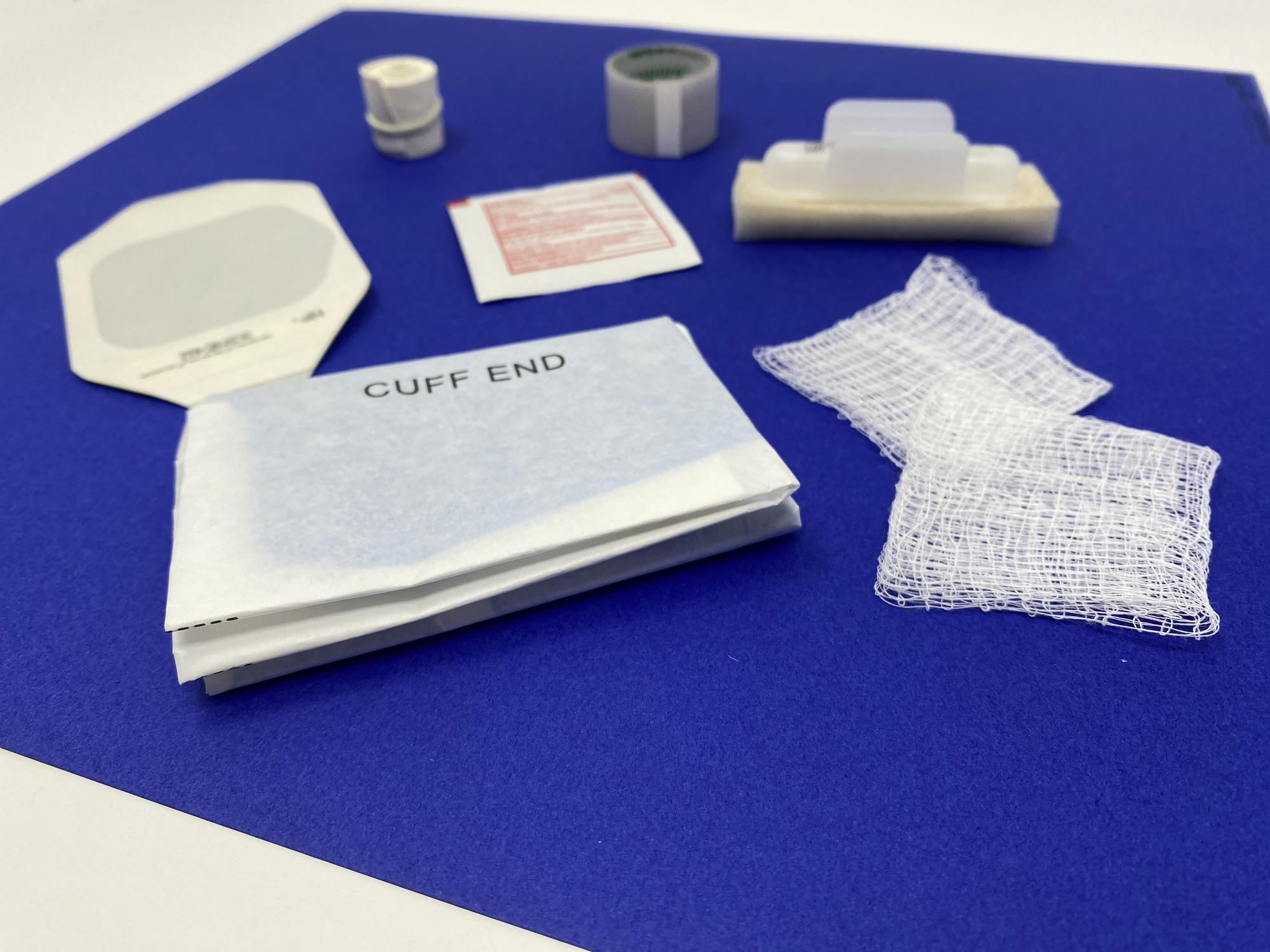 Set of embroidered samples on table
